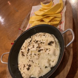 Queso fundido con oregano