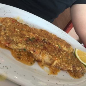 filete de corvina al ajillo