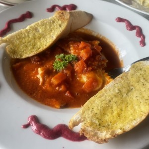 Raviolis de queso en pomodoro