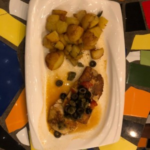 Filete de Corvina a la Ghiotta con papas 