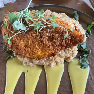 Pollo frito con risotto 