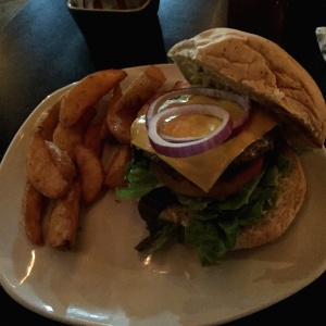 Cheeseburger and seasoned fries