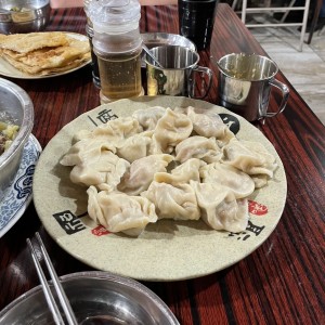 Dumplings de puerco con puerro (sancochado)