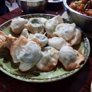 Dumplins de puerco y cebollina