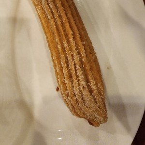 Churro relleno de crema pastelera