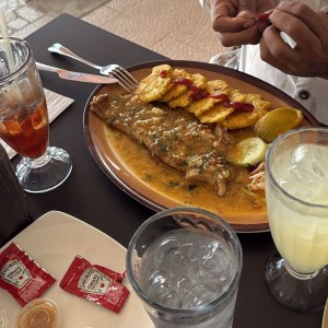 Filete de Corvina al Ajillo