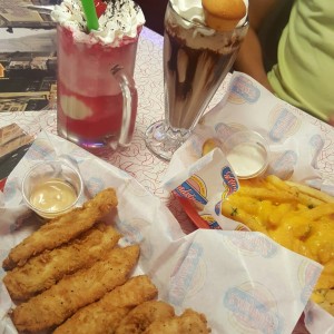 soda float, chocolate milkshake, chicken strips, garlic french fries w/cheese