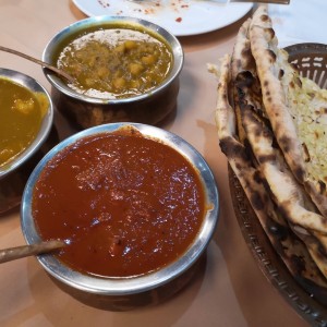 Garlic nan, mutton tikka, garbanzo, shrimp curry