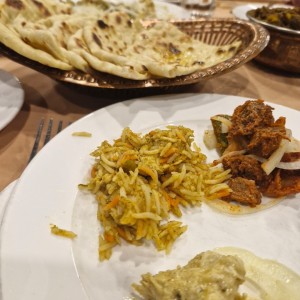 arroz biryani, mutton, naam con mantequilla