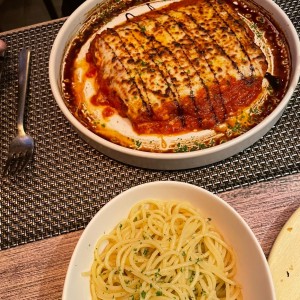 Milanesa de carne con spaghetti al olio 