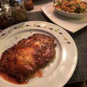 Milanesa de Res a la Parmesana.