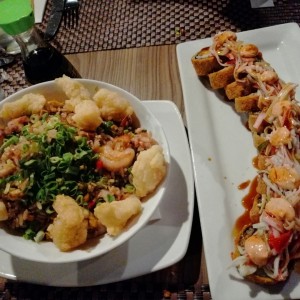 Arroz peruano con mariscos y dragon roll