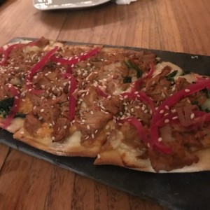 Puerco carnita flatbread