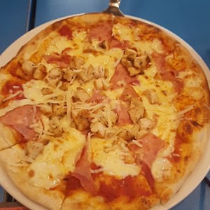 Pizza de pollo toscano