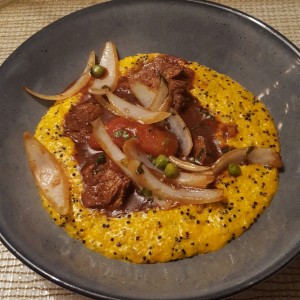 Rissotto de quinoa con lomo saltado