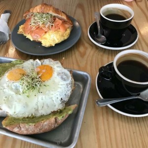 Avocado toast and salmon breakfast sandwich