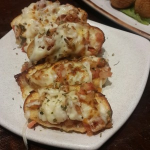 Pan con tomate gratinado