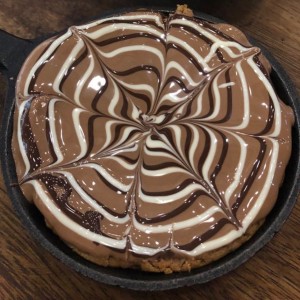 brownie and cookie in a pan 