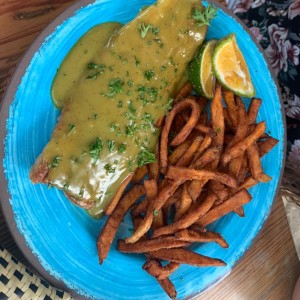 Filete de pescado con curry y coco