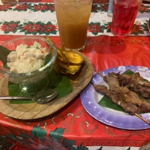 Ceviche y carne en palito