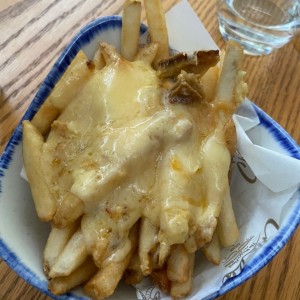 papas con queso raclette