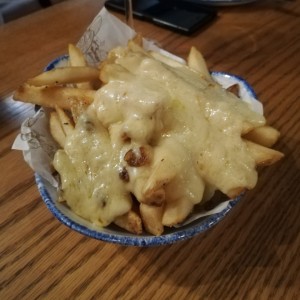 Papas fritas Raclette 