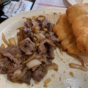 Bistec encebollado