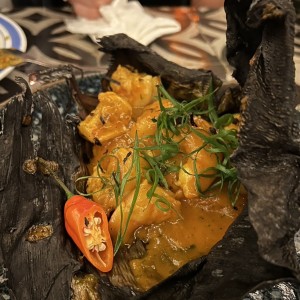 Tamal de arroz con langostino