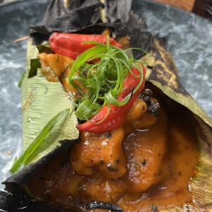 Tamal de arroz con langosta