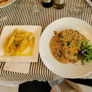 Filete de res a la pimienta con papas al horno