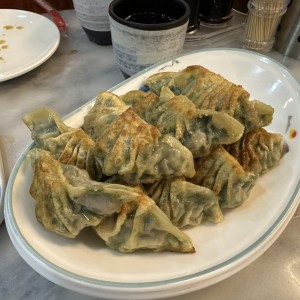 Dumpling de puerco con cebollina