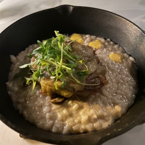 Pato Confitado en Arroz de Hongos