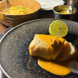 Corvina en arcilla y arroz con coco