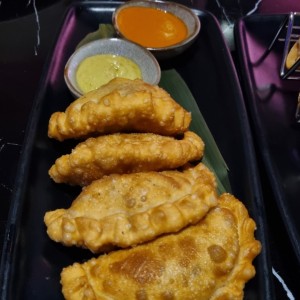 EMPANADAS DE PULPO AL COCO