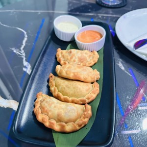 EMPANADAS DE PULPO AL COCO