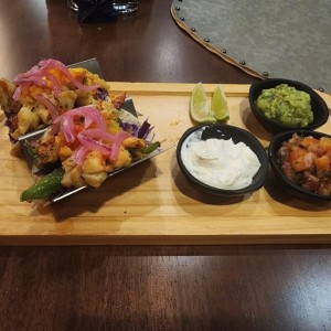 Tacos de langosta al grill