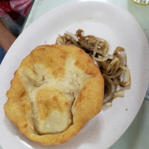 bistec encebollado