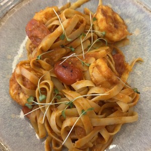 Langostinos con Tomate y Curry