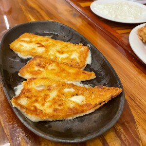 Saganaki crudo