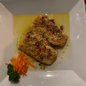 Filete de corvina al ajillo