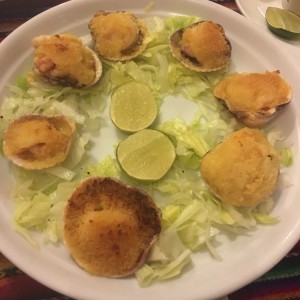 Camarones parmesanos en concha