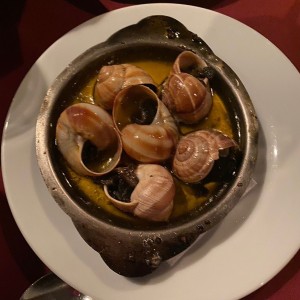 Escargots en salsa de mantequilla