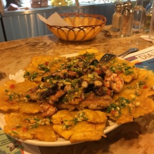 cornina con mariscos a las brasas